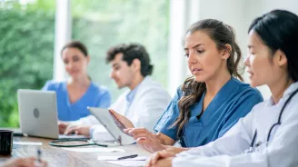 A Resident Speaks with Another Doctor About a Document