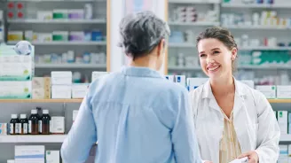 Pharmacist helping customer