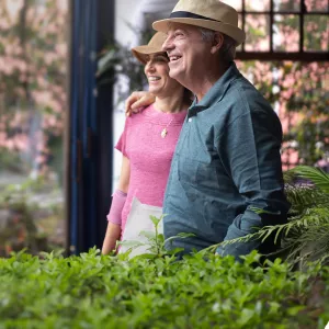 Happy Couple Looking Outside