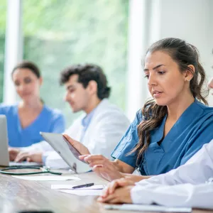 A Resident Speaks with Another Doctor About a Document