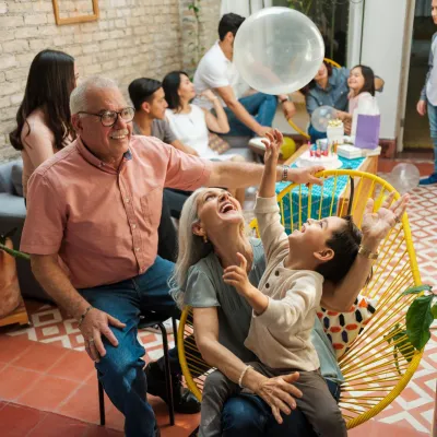 A hispanic family having a party together.