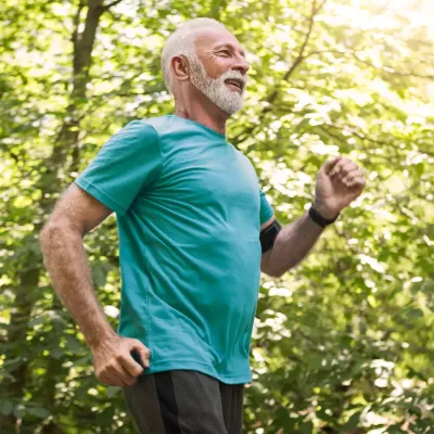 Senior Man Jogging in Park