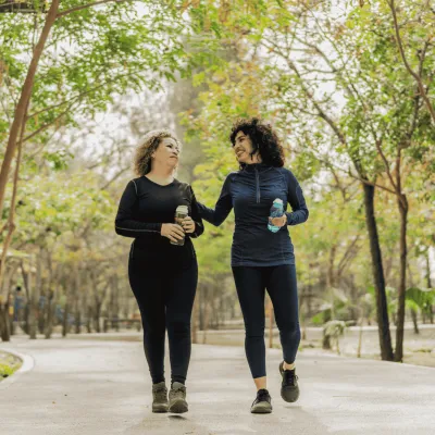 Two woman walking together