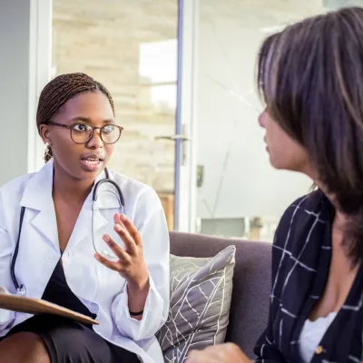 Female Doctor Talking to Female Patient