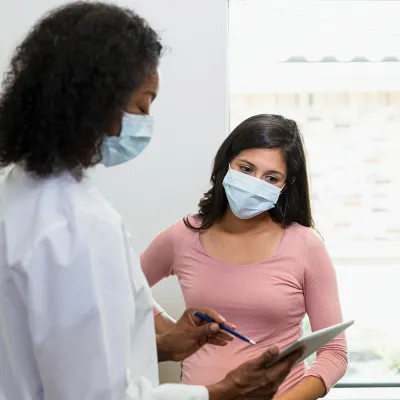 Doctor talking to patient about mammogram results