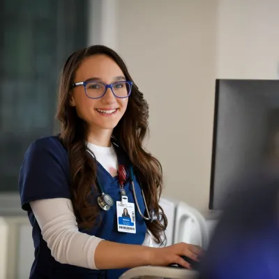Nurse Taking Notes for Patient Visit