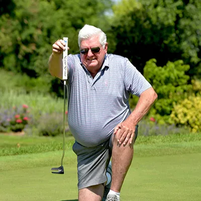 John Brockob Kneeling in Front of Putt