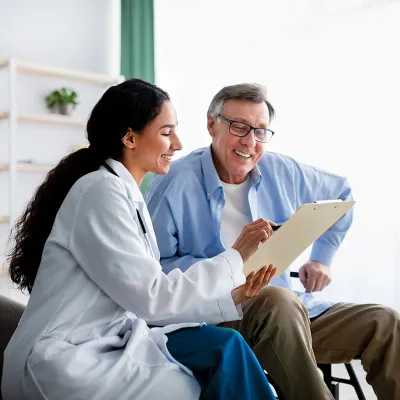 Physician showing results to a patient.