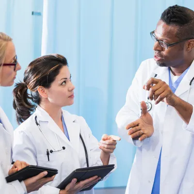 Group of Medical Residents Talking to Each Other