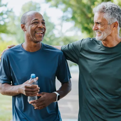 Two Men Walking in Park