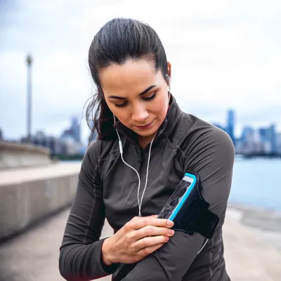 Woman Active Outdoors Near City