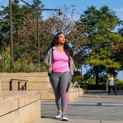 Woman Walking Outdoors in Chicago Area