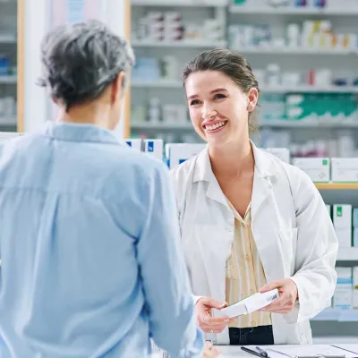 Pharmacist helping customer
