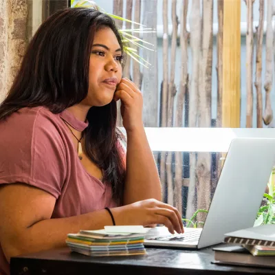 Young woman using laptop