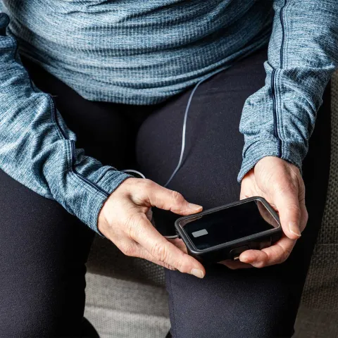 A man with a diabetes device.