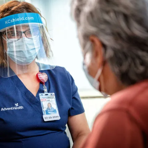 An AdventHealth nurse with a patient