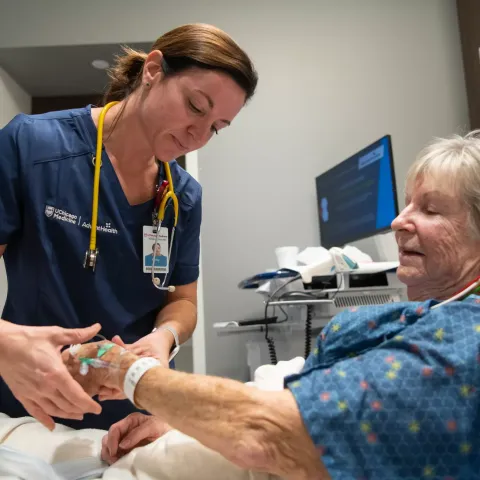 UChicago Medicine AdventHealth Nurse Helping White Senior Woman in Emergency Room