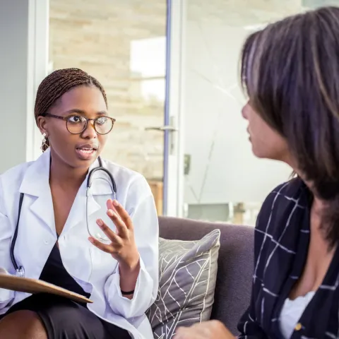 Female Doctor Talking to Female Patient