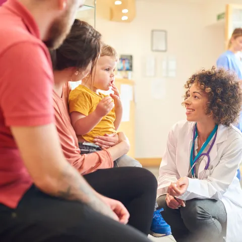 Doctor Attending to Child