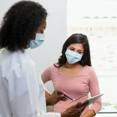 Doctor talking to patient about mammogram results