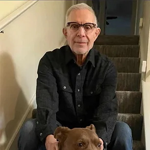 George Cacini, AFib Patient with his dog.