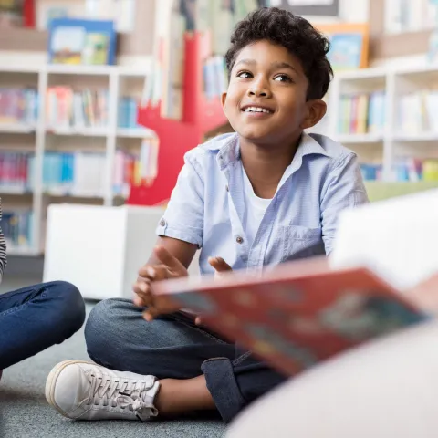 Hero Child at School During Storytime