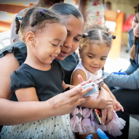 A dominican republic mother with her two daughters 