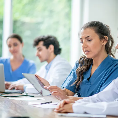 A Resident Speaks with Another Doctor About a Document