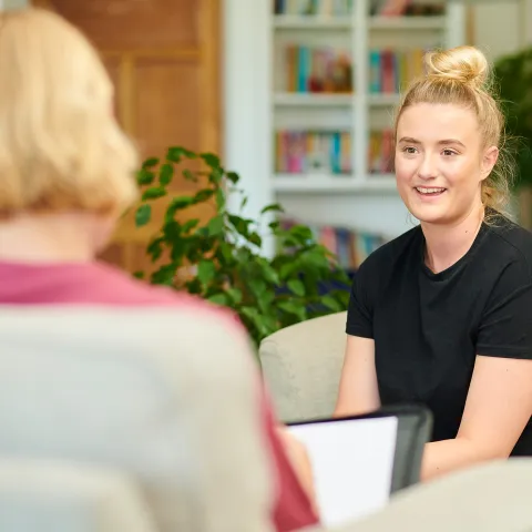 Teen Girl Talking to Counselor