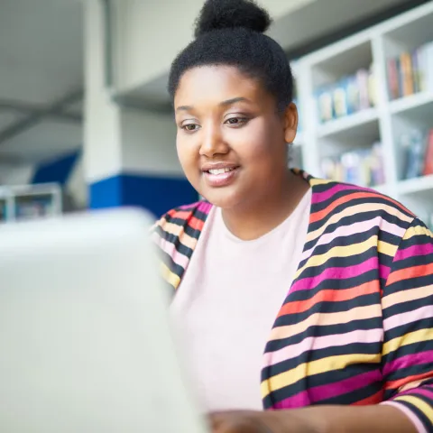 Woman Using Laptop