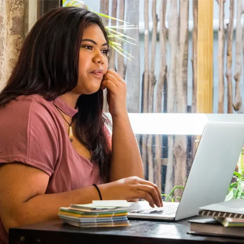 Young woman using laptop