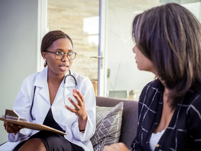 Female Doctor Talking to Female Patient