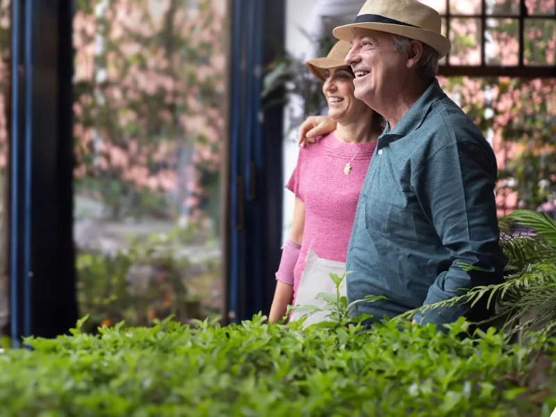 Happy Couple Looking Outside