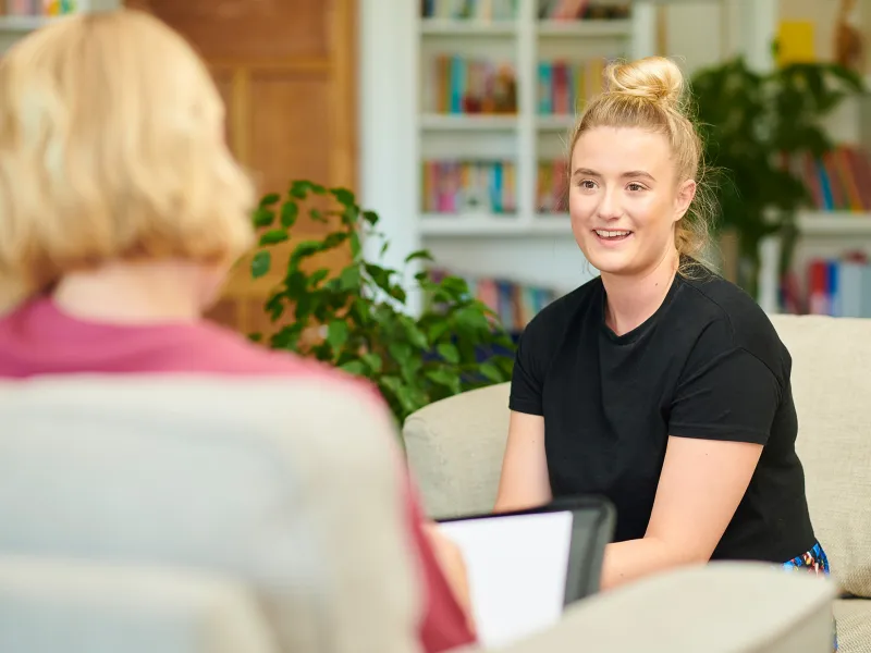 Teen Girl Talking to Counselor