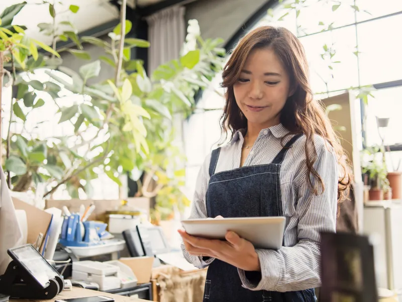 Young Adult Girl Working in Plant Nursery