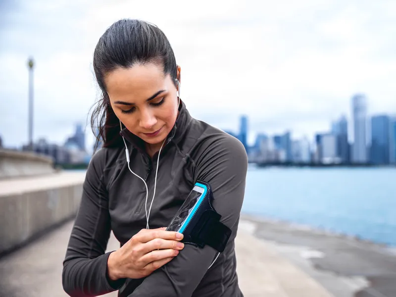 Woman Active Outdoors Near City