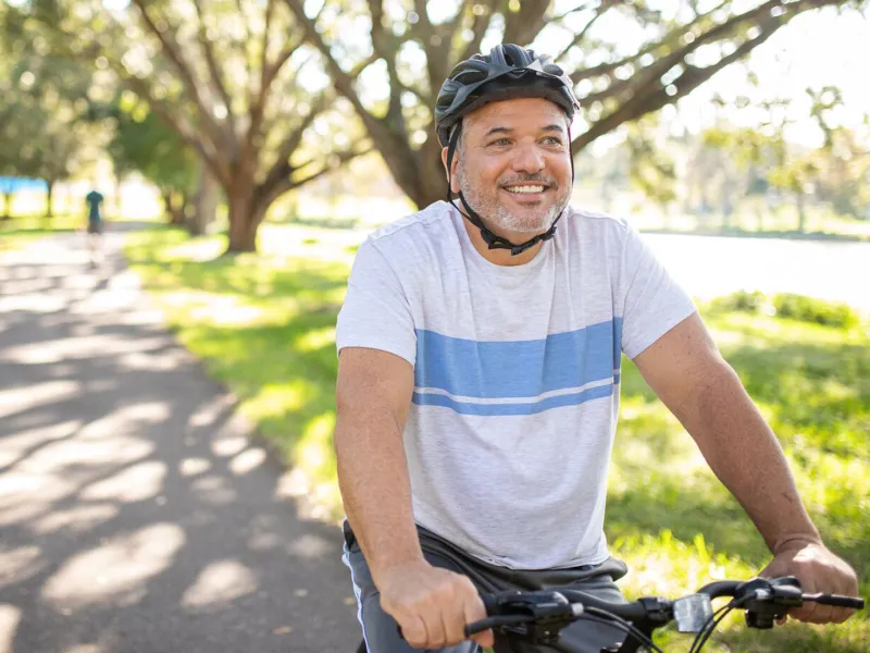 Man Riding Bike in Park