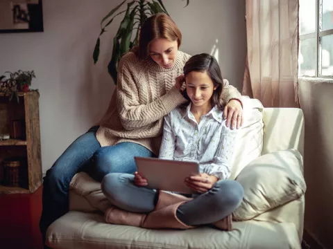 Teen Girl with Mom Filling Out Form