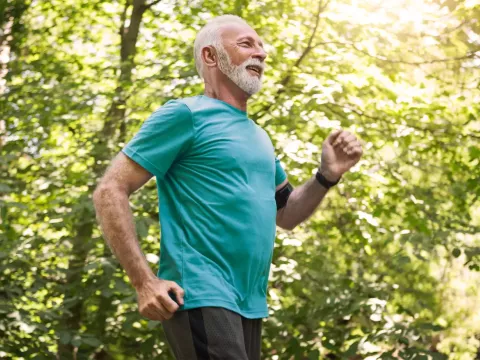 Senior Man Jogging in Park