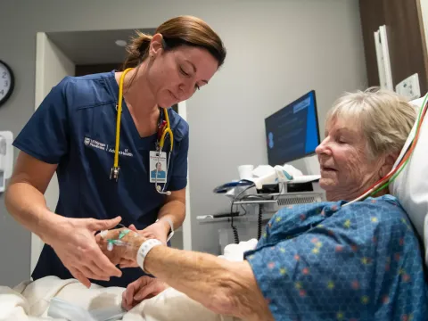 UChicago Medicine AdventHealth Nurse Helping White Senior Woman in Emergency Room