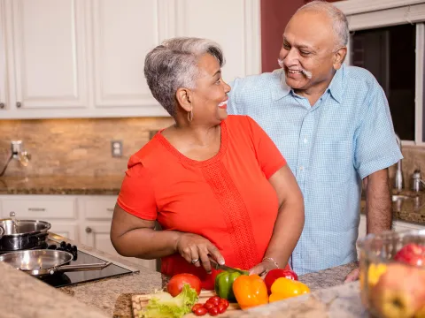 Couple cooking heart healthy meal
