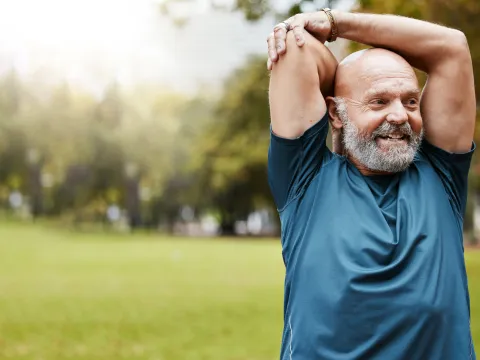 Senior Man Stretching Outdoors