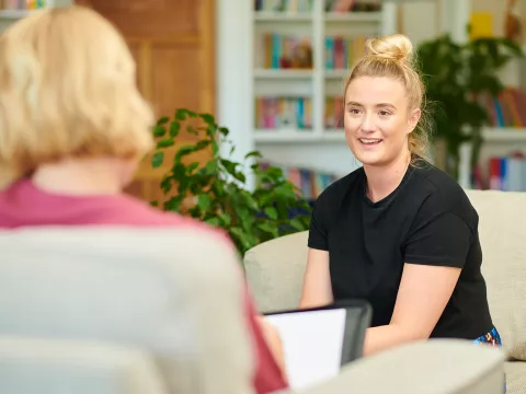 Teen Girl Talking to Counselor