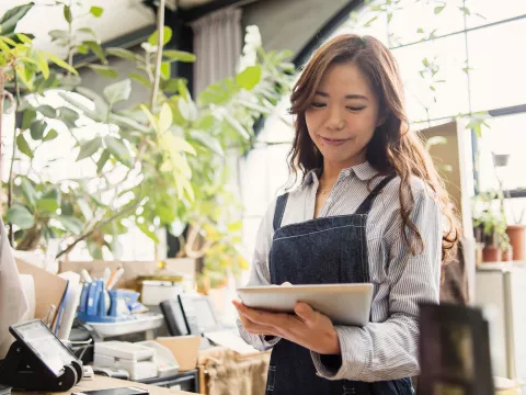 Young Adult Girl Working in Plant Nursery