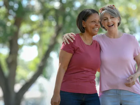 Two women jogging in park
