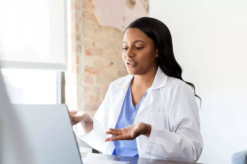 A doctor engaged in a virtual conversation