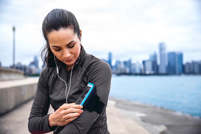 Woman Active Outdoors Near City
