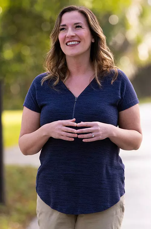 happy woman walking outside