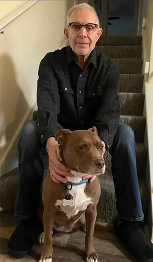 George Cacini, AFib Patient with his dog.