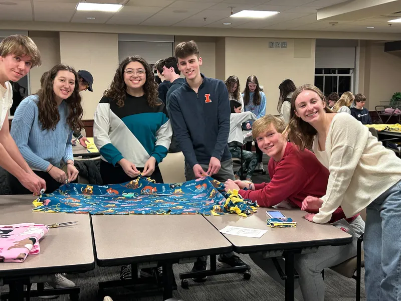 Teens helping at Junior Board Event